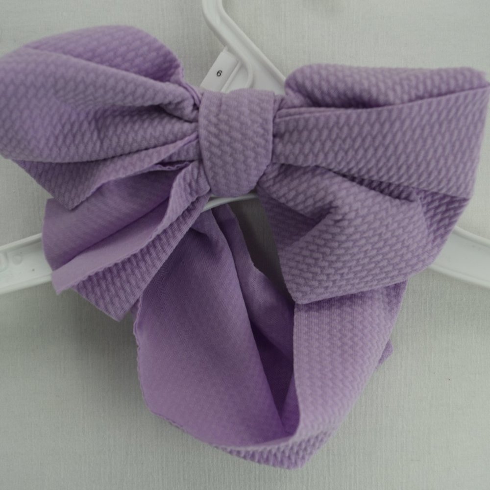 Lavender Colored, Elastic Bow Headband, For Ages 0-3.